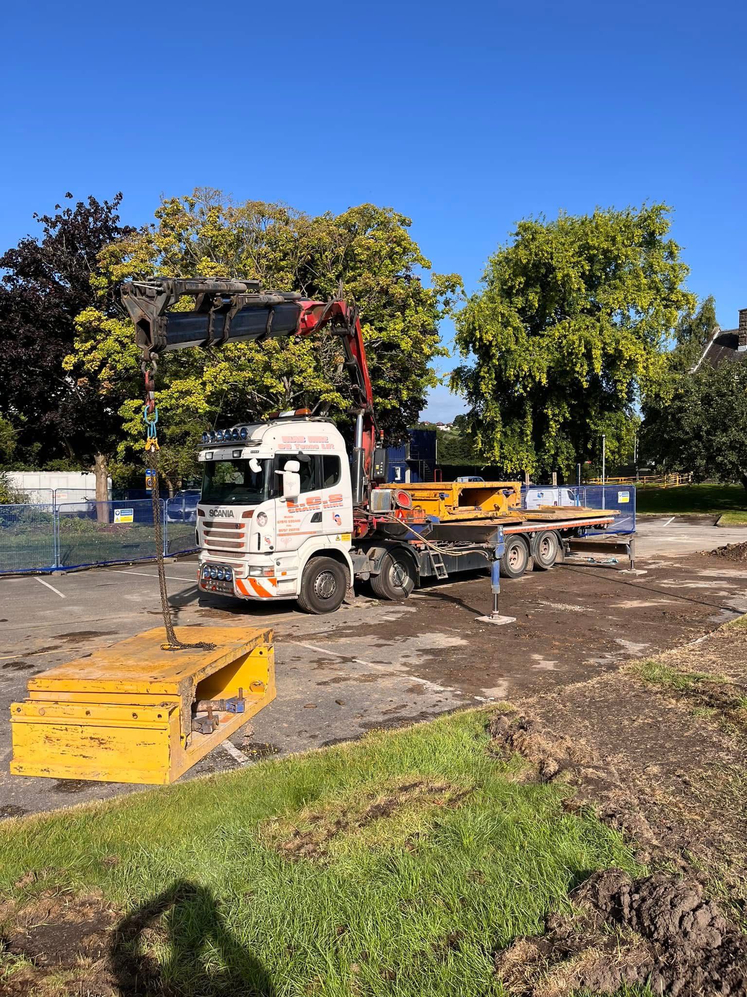 Vehicle-mounted crane on site