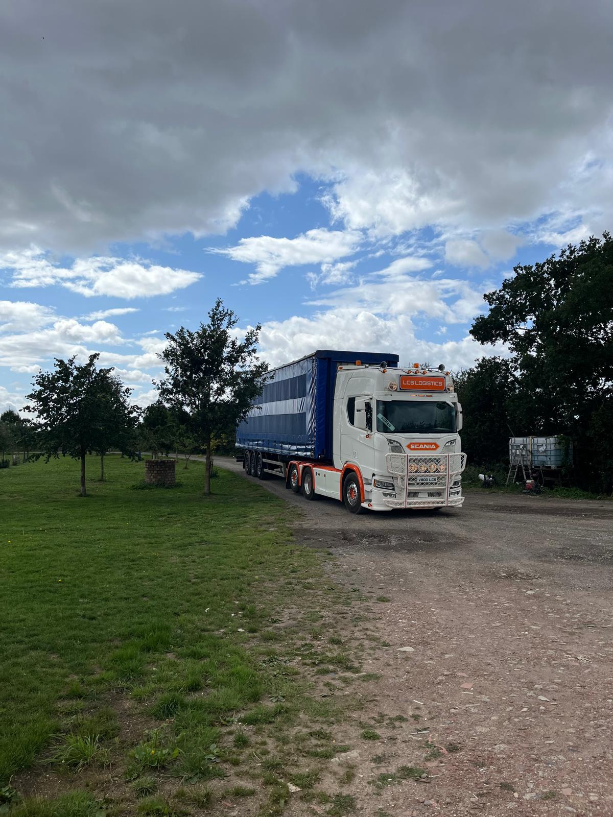 Haulage vehicle transporting poultry equipment